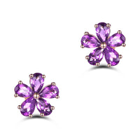 Cercei placati cu paladiu, cu flori din cristale zirconii mov si ace de argint 925