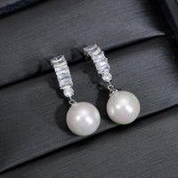 Cercei placati cu paladiu, cu ace de argint si perla din cristal