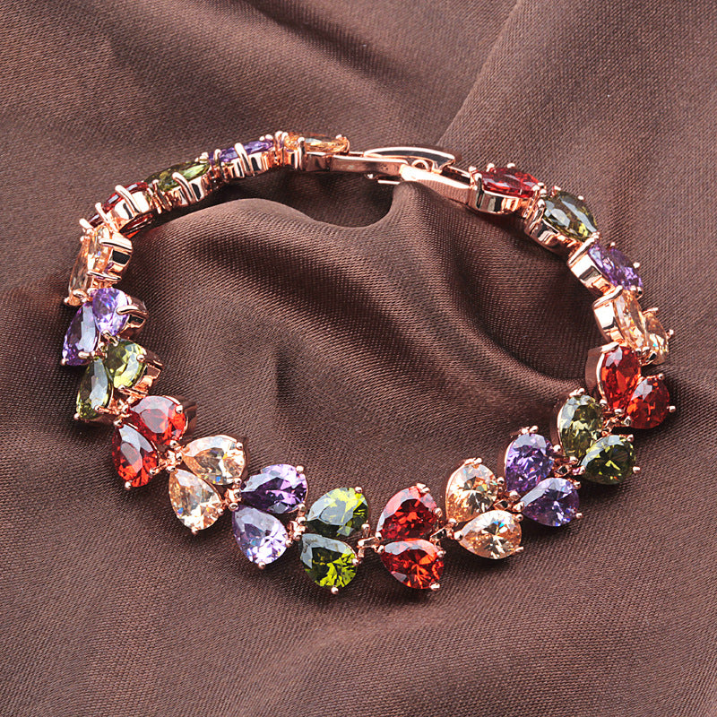 Bratara placata cu aur roz, cu cristale zirconii colorate si inchidere fixa