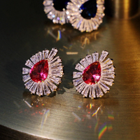 Cercei placati cu paladiu in forma de lacrima, cu zirconii