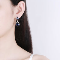 Cercei placati cu paladiu in forma de lacrima, cu zirconii