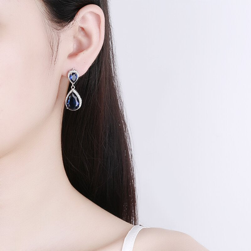 Cercei placati cu paladiu in forma de lacrima, cu zirconii