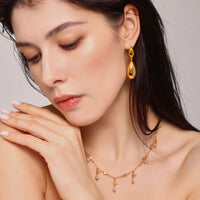 Cercei asimetrici lungi în formă de picătură din oțel inoxidabil placați cu aur 18K