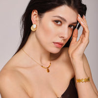 Cercei „Fleur de Lys" din oțel inoxidabil placați cu aur 18K