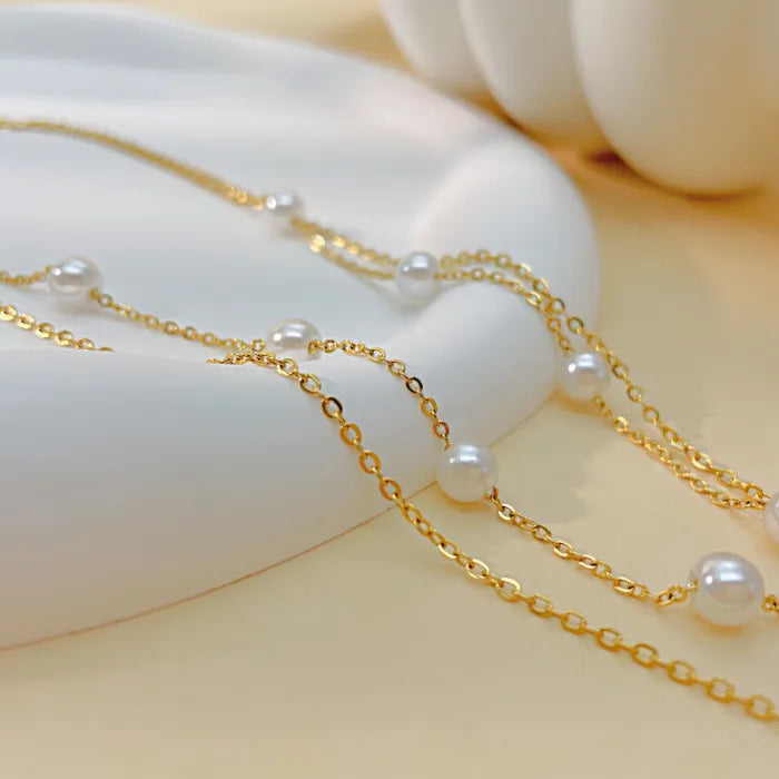 Colier elegant în două straturi cu perlă și floare aurie