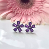 Cercei placati cu paladiu, cu flori din cristale zirconii mov si ace de argint 925